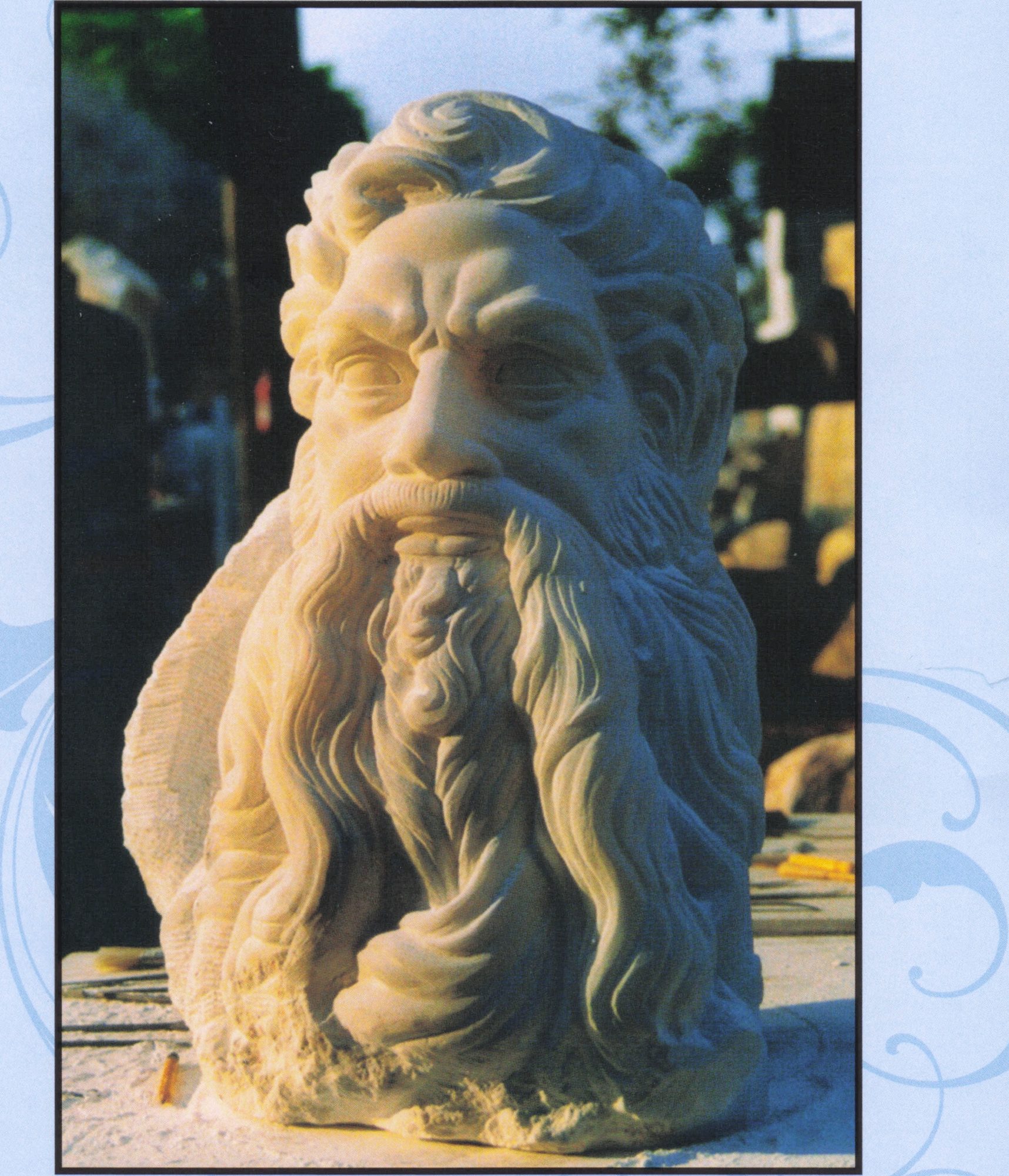 Italian alabaster sculpture Head of Moses by Michael Tine: a bearded head with long flowing hair and beard
